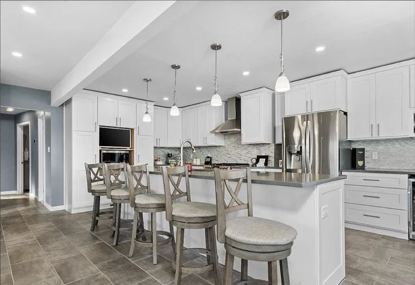 After — Brighton — lake house kitchen & living room